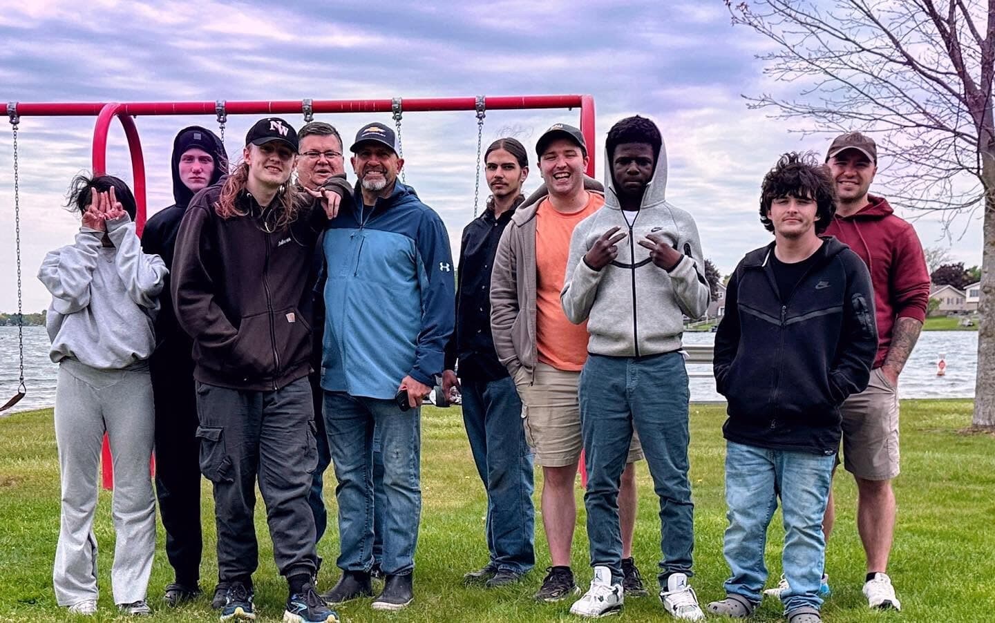 Rise Above students and staff together at the lake